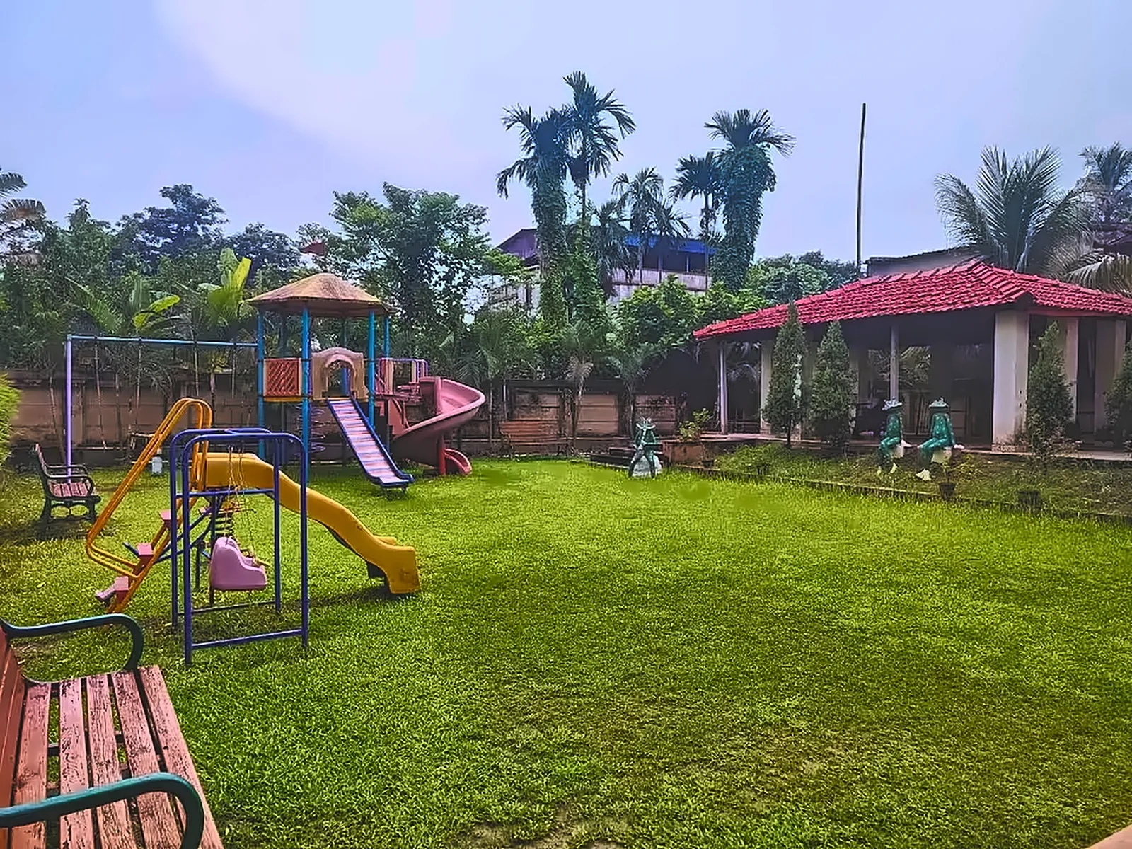 Outdoor playground — Wide green lawns for little ones to play.